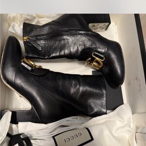Gucci Black Leather Heeled Boots with Gold Accents